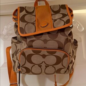 Coach signature fabric backpack w/orange patent leather trim Great condition!